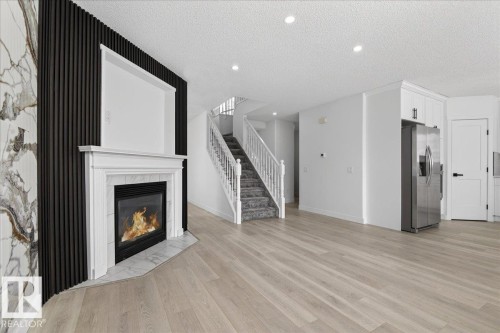8916 175 Avenue, Edmonton, AB - Indoor Photo Showing Living Room With Fireplace