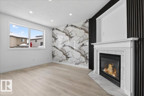 8916 175 Avenue, Edmonton, AB - Indoor Photo Showing Living Room With Fireplace