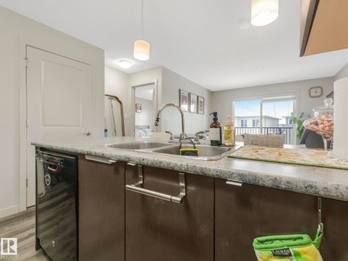212 508 Albany Way, Edmonton, AB - Indoor Photo Showing Kitchen With Double Sink
