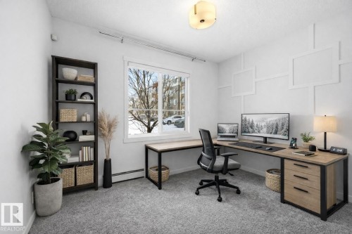 Second bedroom virtually staged as a home office - 106 812 Welsh Drive, Edmonton, AB - Indoor Photo Showing Office