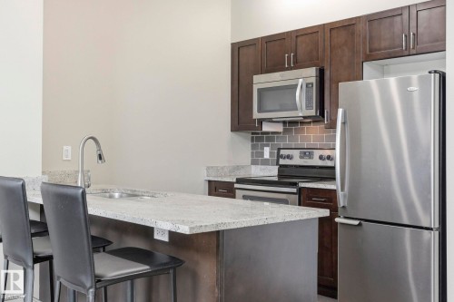 503 1230 Windermere Way, Edmonton, AB - Indoor Photo Showing Kitchen With Upgraded Kitchen