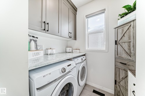 36 2072 Wonnacott Way, Edmonton, AB - Indoor Photo Showing Laundry Room