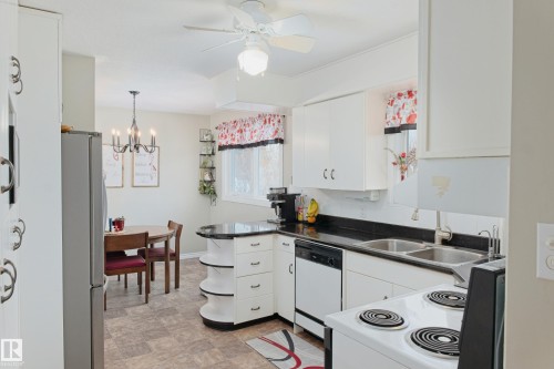 4505 57 Avenue, Barrhead, AB - Indoor Photo Showing Kitchen With Double Sink