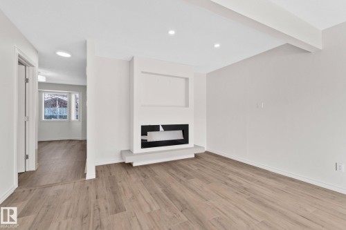 22 9703 174 Street Nw, Edmonton, AB - Indoor With Fireplace