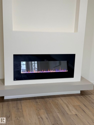 22 9703 174 Street Nw, Edmonton, AB - Indoor With Fireplace