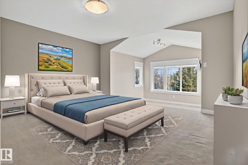 Bedroom with lofted ceiling and baseboards - 613 Stewart Crescent, Edmonton, AB - Indoor Photo Showing Bedroom