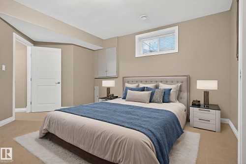 Bedroom with light carpet - 613 Stewart Crescent, Edmonton, AB - Indoor Photo Showing Bedroom
