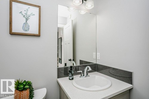 Bathroom with vanity and toilet - 6710 Cardinal Road, Edmonton, AB - Indoor Photo Showing Bathroom