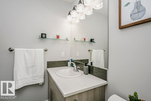 Bathroom with vanity and toilet - 6710 Cardinal Road, Edmonton, AB - Indoor Photo Showing Bathroom