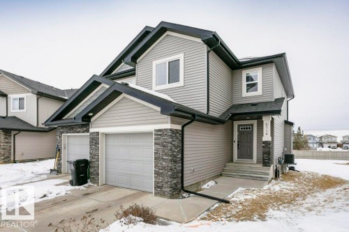 View of front of property featuring stone siding - 6710 Cardinal Road, Edmonton, AB - Outdoor