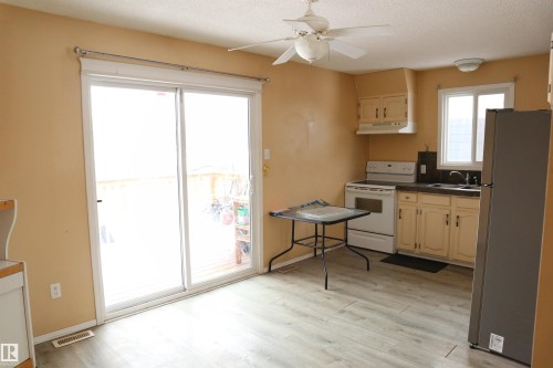 5205 55 Street, Thorsby, AB - Indoor Photo Showing Kitchen With Double Sink