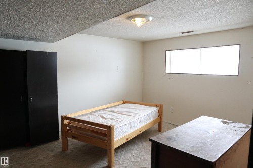 5205 55 Street, Thorsby, AB - Indoor Photo Showing Bedroom