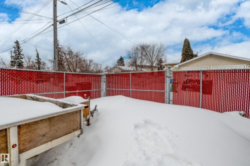 Snowy yard with a gate - 13420 113A St, Edmonton, AB - Outdoor