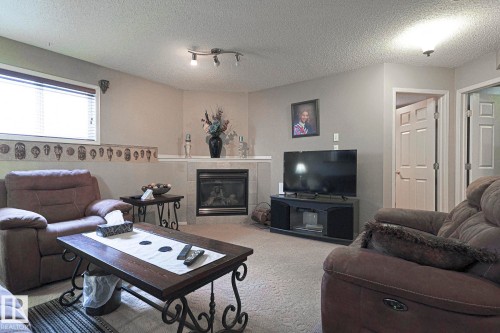 21304 88 Avenue, Edmonton, AB - Indoor Photo Showing Living Room With Fireplace