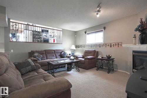 21304 88 Avenue, Edmonton, AB - Indoor Photo Showing Living Room With Fireplace