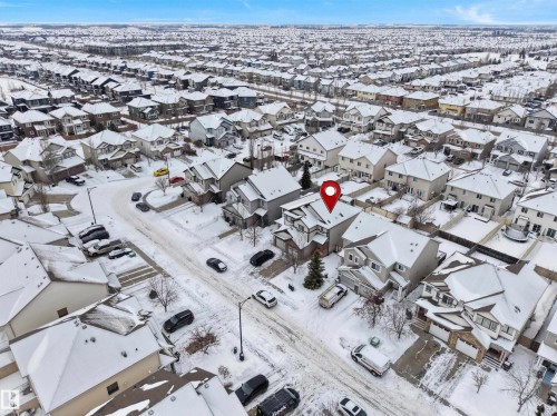 Snowy aerial view with a residential view - 1716 64 Street, Edmonton, AB - Outdoor With View