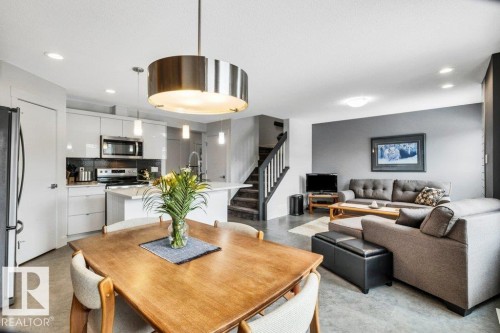 Dining area with recessed lighting and finished concrete floors - 6485 King Wynd, Edmonton, AB - Indoor Photo Showing Other Room