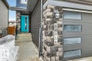 Doorway to property featuring stone siding - 6485 King Wynd, Edmonton, AB  - Outdoor 