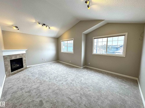 1473 Wates Link, Edmonton, AB - Indoor With Fireplace