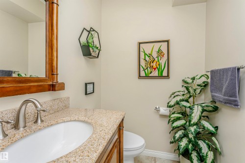 Half bathroom featuring vanity and toilet - 18507 92 Avenue, Edmonton, AB - Indoor Photo Showing Bathroom