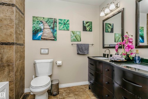 Full bathroom featuring double vanity and a shower - 18507 92 Avenue, Edmonton, AB - Indoor Photo Showing Bathroom