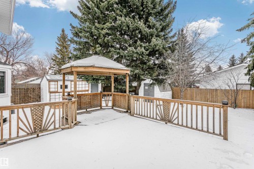 Snow covered deck featuring a shed, a gazebo, and a fenced backyard - 18507 92 Avenue, Edmonton, AB - Outdoor With Deck Patio Veranda