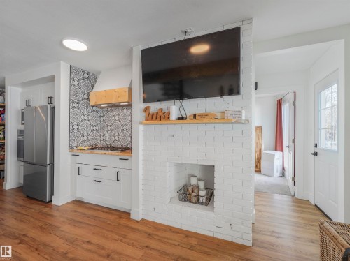 809 8 Street, Rural Lac Ste. Anne County, AB - Indoor Photo Showing Living Room With Fireplace