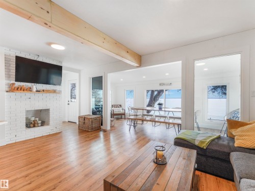 809 8 Street, Rural Lac Ste. Anne County, AB - Indoor Photo Showing Living Room With Fireplace