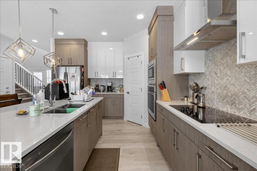 86 Edgefield Way, St. Albert, AB - Indoor Photo Showing Kitchen With Double Sink With Upgraded Kitchen