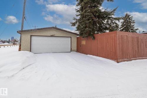 Snow covered garage with a garage - 10971 157 Street, Edmonton, AB - Outdoor