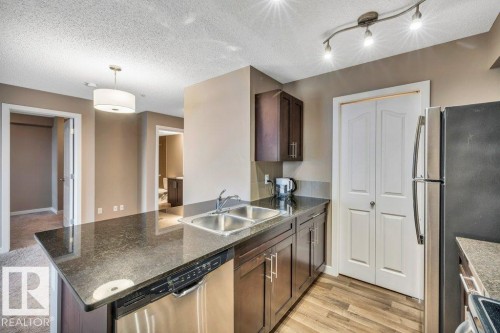 208 12035 22 Avenue, Edmonton, AB - Indoor Photo Showing Kitchen With Stainless Steel Kitchen With Double Sink With Upgraded Kitchen