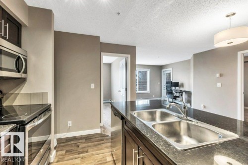 208 12035 22 Avenue, Edmonton, AB - Indoor Photo Showing Kitchen With Double Sink