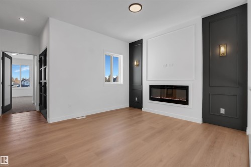 34 Grayson Green, Stony Plain, AB - Indoor Photo Showing Living Room With Fireplace