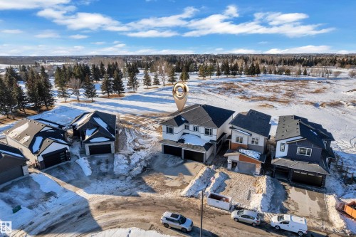 Snowy aerial view featuring a residential view - 34 Grayson Green, Stony Plain, AB - Outdoor With View