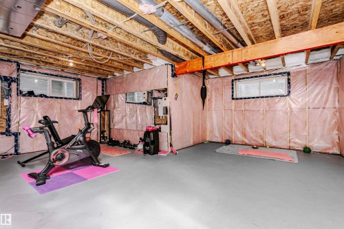 Exercise area featuring concrete floors - 7322 Chivers Crescent, Edmonton, AB - Indoor Photo Showing Basement