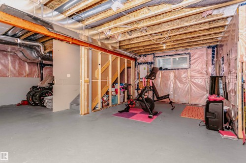 Unfinished basement featuring stairs - 7322 Chivers Crescent, Edmonton, AB - Indoor Photo Showing Basement