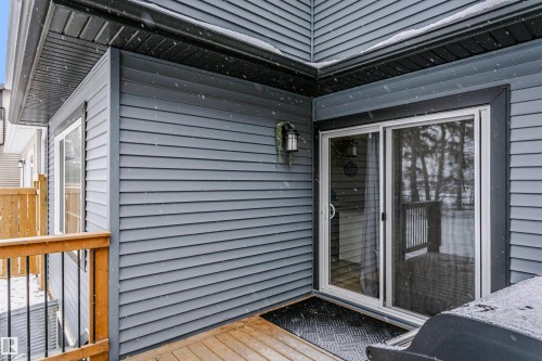 Entrance to property featuring a deck - 7322 Chivers Crescent, Edmonton, AB - Outdoor With Exterior