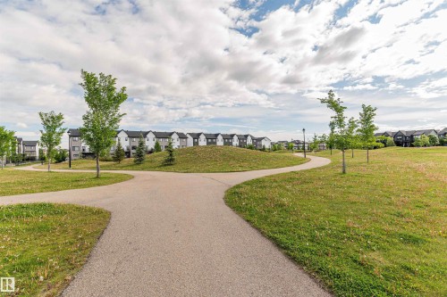 View of home's community featuring a residential view - 7322 Chivers Crescent, Edmonton, AB - Outdoor With View