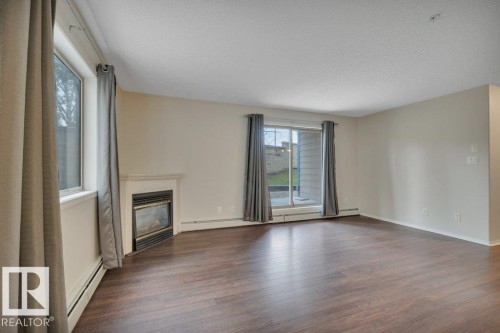 102 2903 Rabbit Hill Road, Edmonton, AB - Indoor With Fireplace