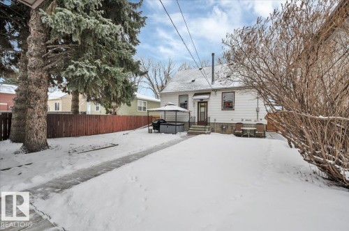 Snow covered back of property featuring a gazebo - 7934 81 Avenue Nw, Edmonton, AB - Outdoor