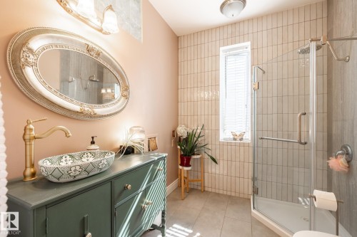 Full bathroom featuring a shower stall, light tile patterned floors, and vanity - 11415 85 Street, Edmonton, AB - Indoor Photo Showing Bathroom