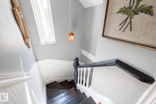 Stairs featuring wainscoting - 11415 85 Street, Edmonton, AB - Indoor Photo Showing Other Room