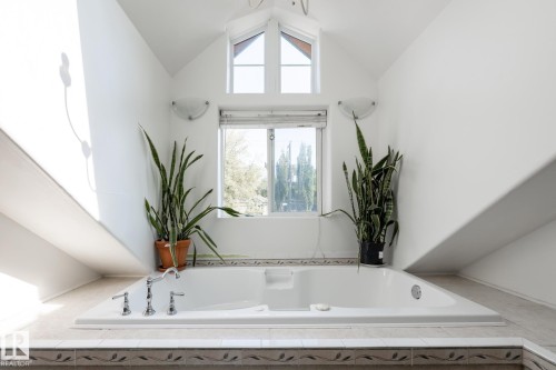 Bathroom featuring a garden tub - 11415 85 Street, Edmonton, AB - Indoor Photo Showing Bathroom