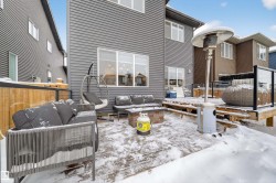 Snow covered deck with outdoor lounge area - 