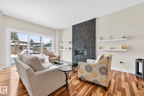 10283 89 Street, Edmonton, AB - Indoor Photo Showing Living Room With Fireplace