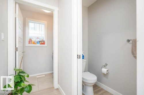 Bathroom featuring light wood-style flooring - 96 1530 Tamarack Boulevard, Edmonton, AB - Indoor Photo Showing Bathroom