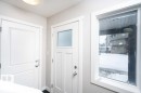 Doorway with a textured ceiling and baseboards - 96 1530 Tamarack Boulevard, Edmonton, AB  - Indoor Photo Showing Other Room 