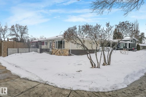 View of front of house featuring stone siding - 2 Scarboro Place, St. Albert, AB - Outdoor