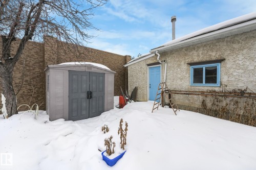 Snowy yard featuring a shed - 2 Scarboro Place, St. Albert, AB - Outdoor