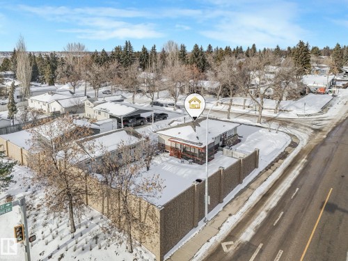 Snowy aerial view with a residential view and view of scattered trees - 2 Scarboro Place, St. Albert, AB - Outdoor With View
